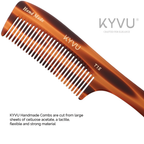 Close-up of KYVU T15 wide tooth cellulose acetate comb showing hand-polished coarse teeth and tortoiseshell finish